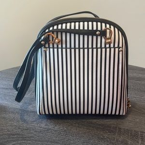 Slightly used MIZTIQUE purse/backpack (converts)